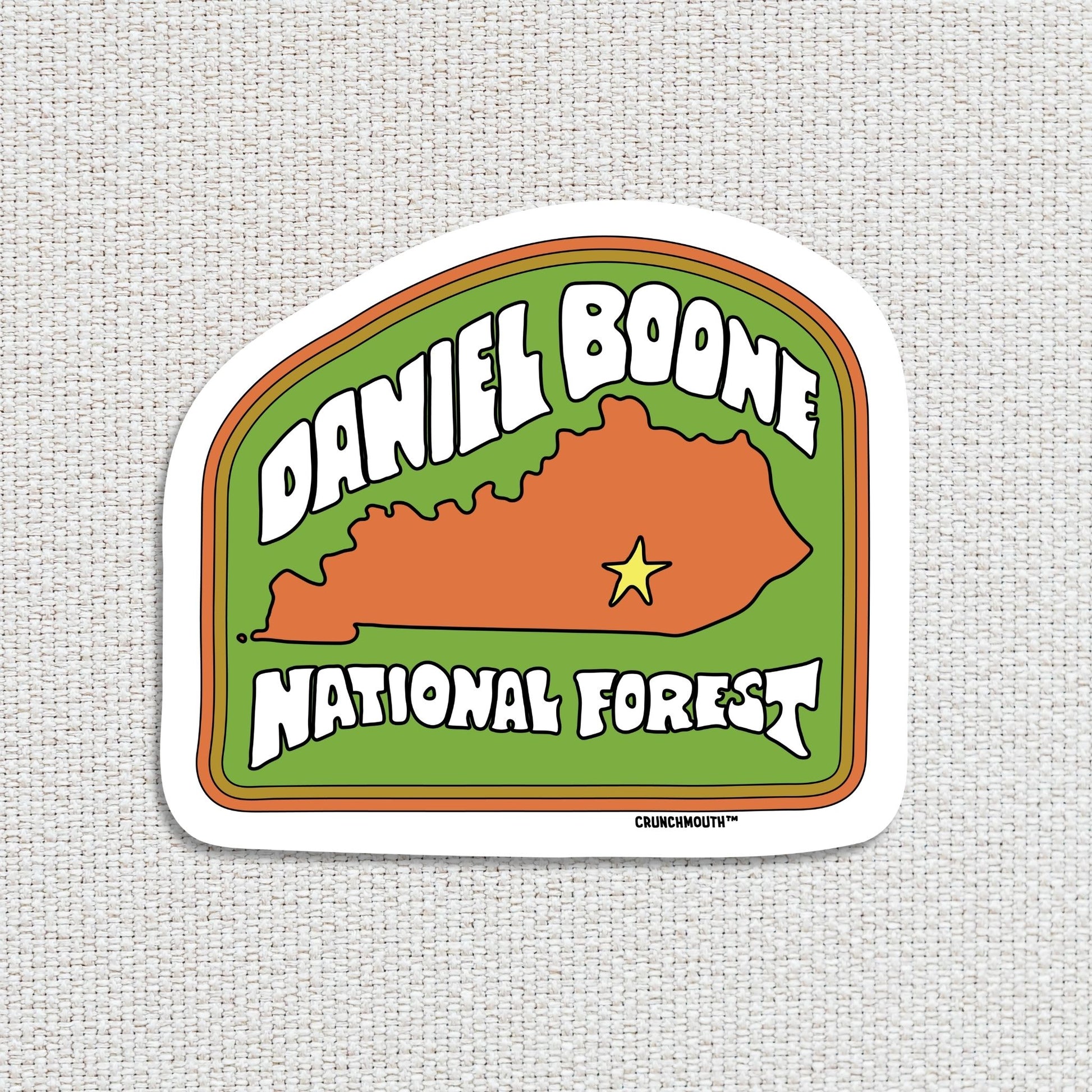 Daniel boone national forest travel luggage sticker, textured fabric background
