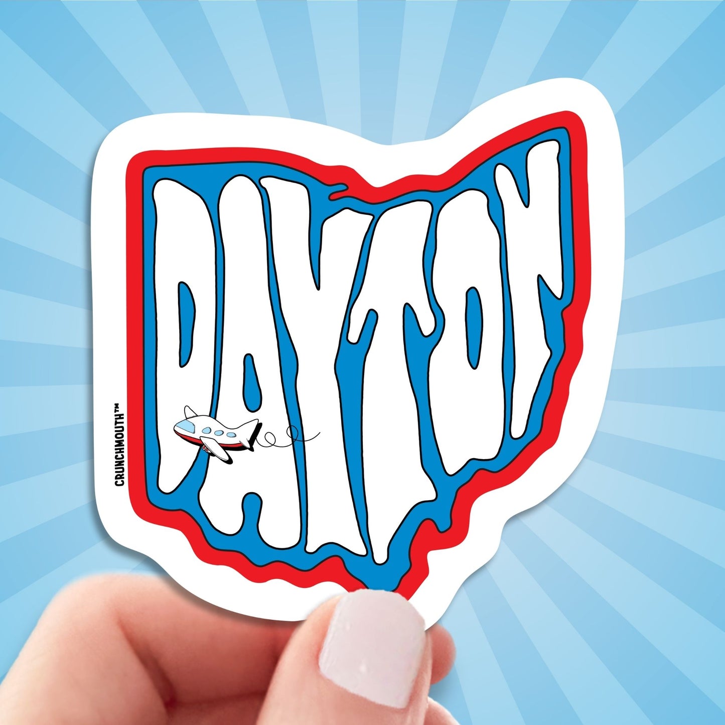 dayton travel luggage sticker, hand display, sun rays design background