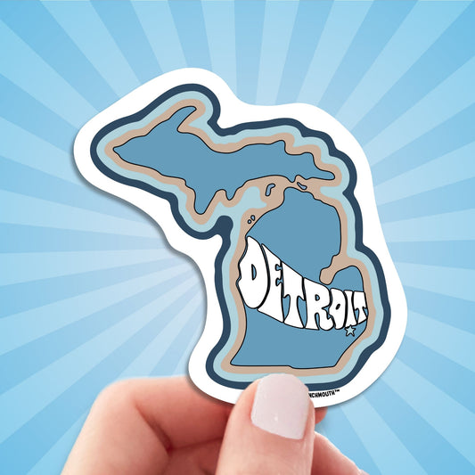 detroit travel luggage sticker, hand display, sun rays design background