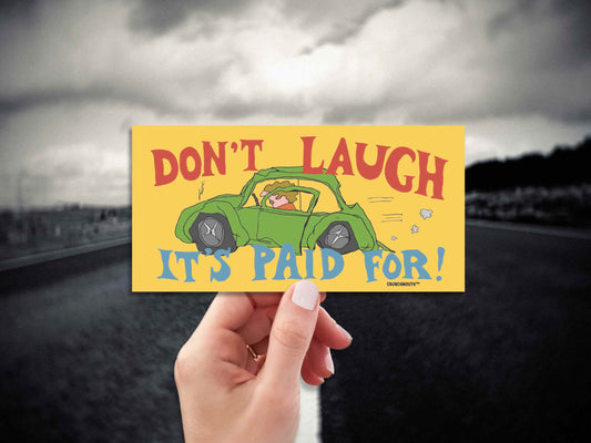 don't laugh it's paid for, funny bumper stickers, hand display, black and white highway landscape background