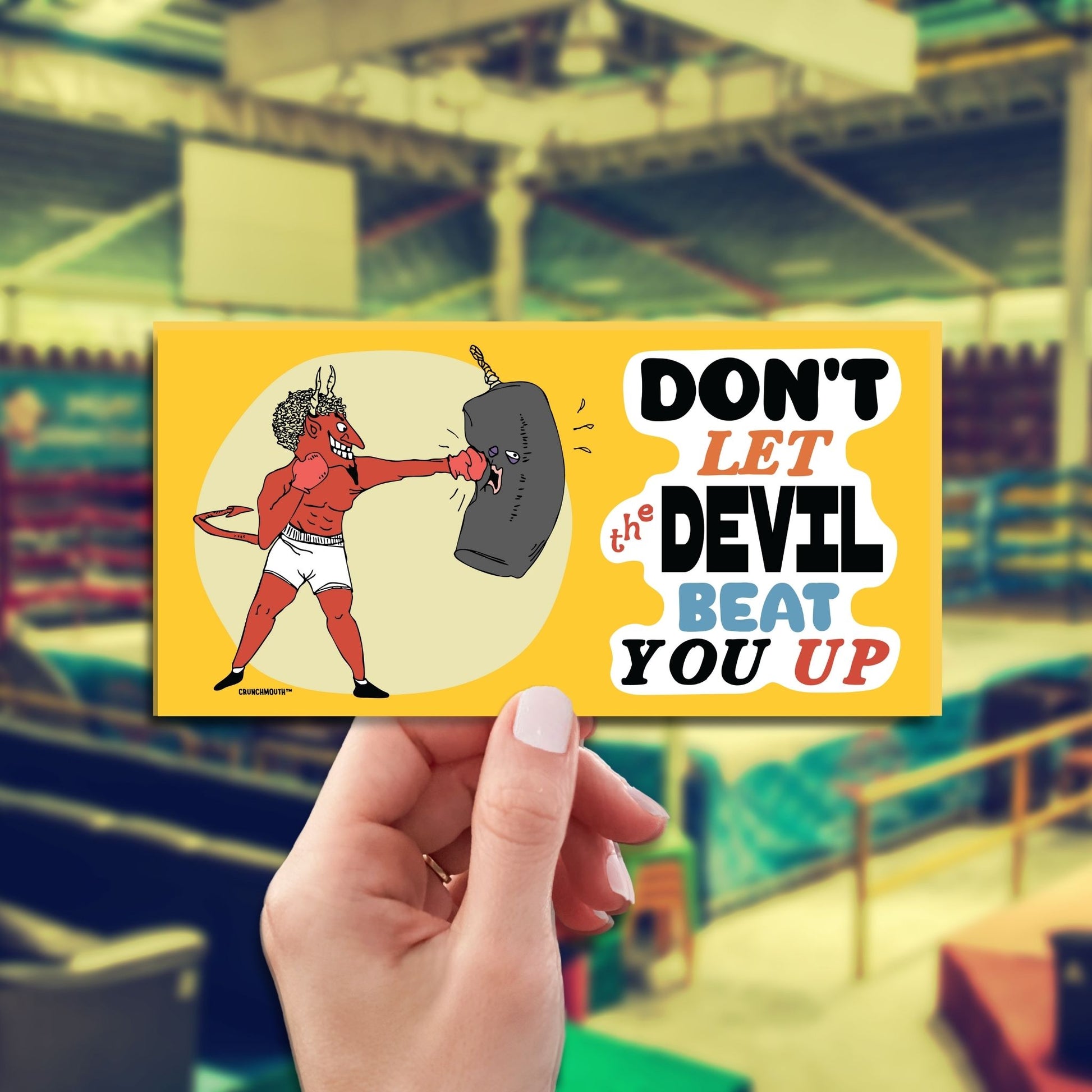 don't let the devil beat you up bumper sticker, hand display, boxing ring background