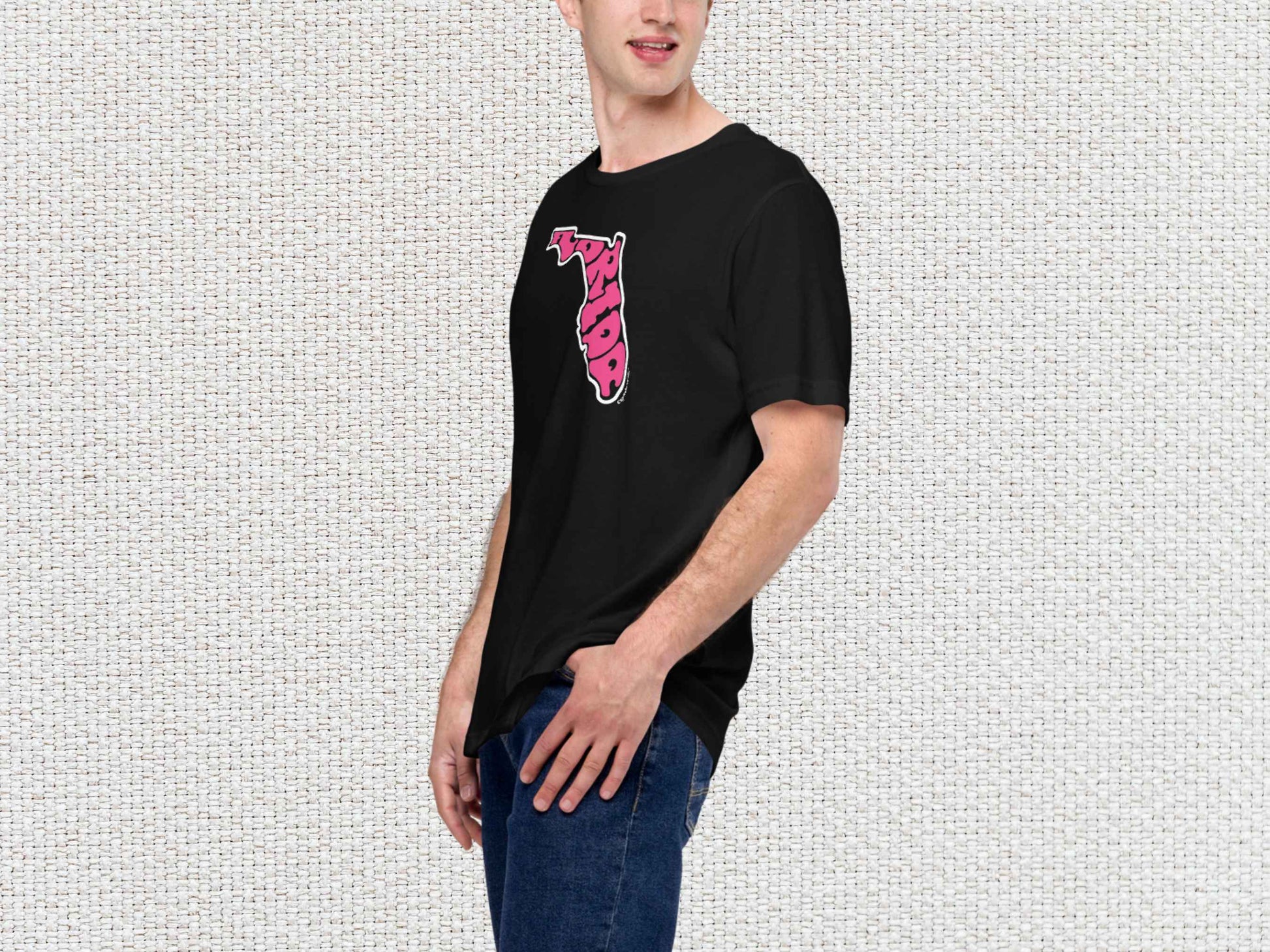 florida shirt, souvenir t shirts, male model, front left, light color textured background