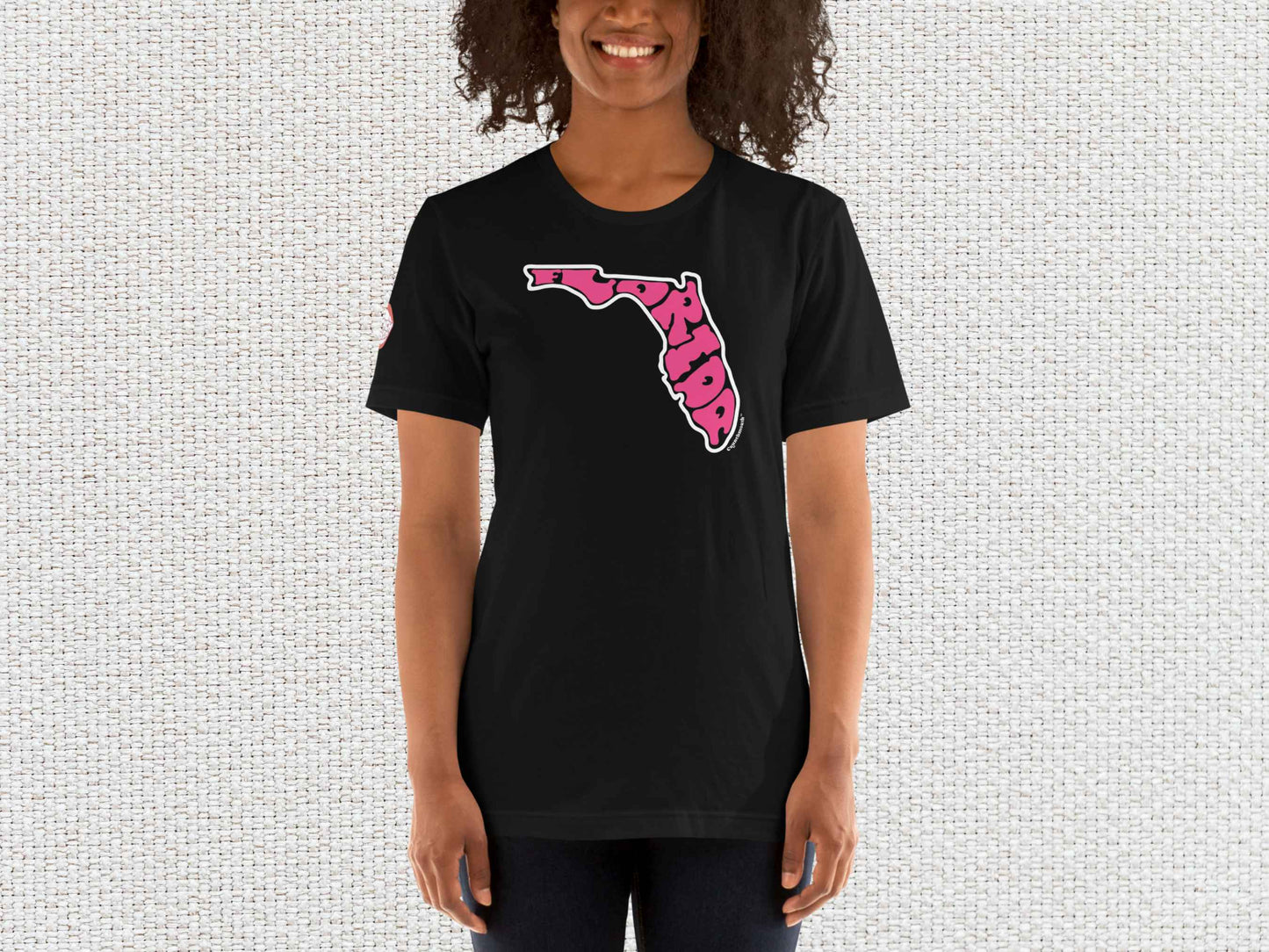 florida shirt, souvenir t shirts, female model, front, light color textured background