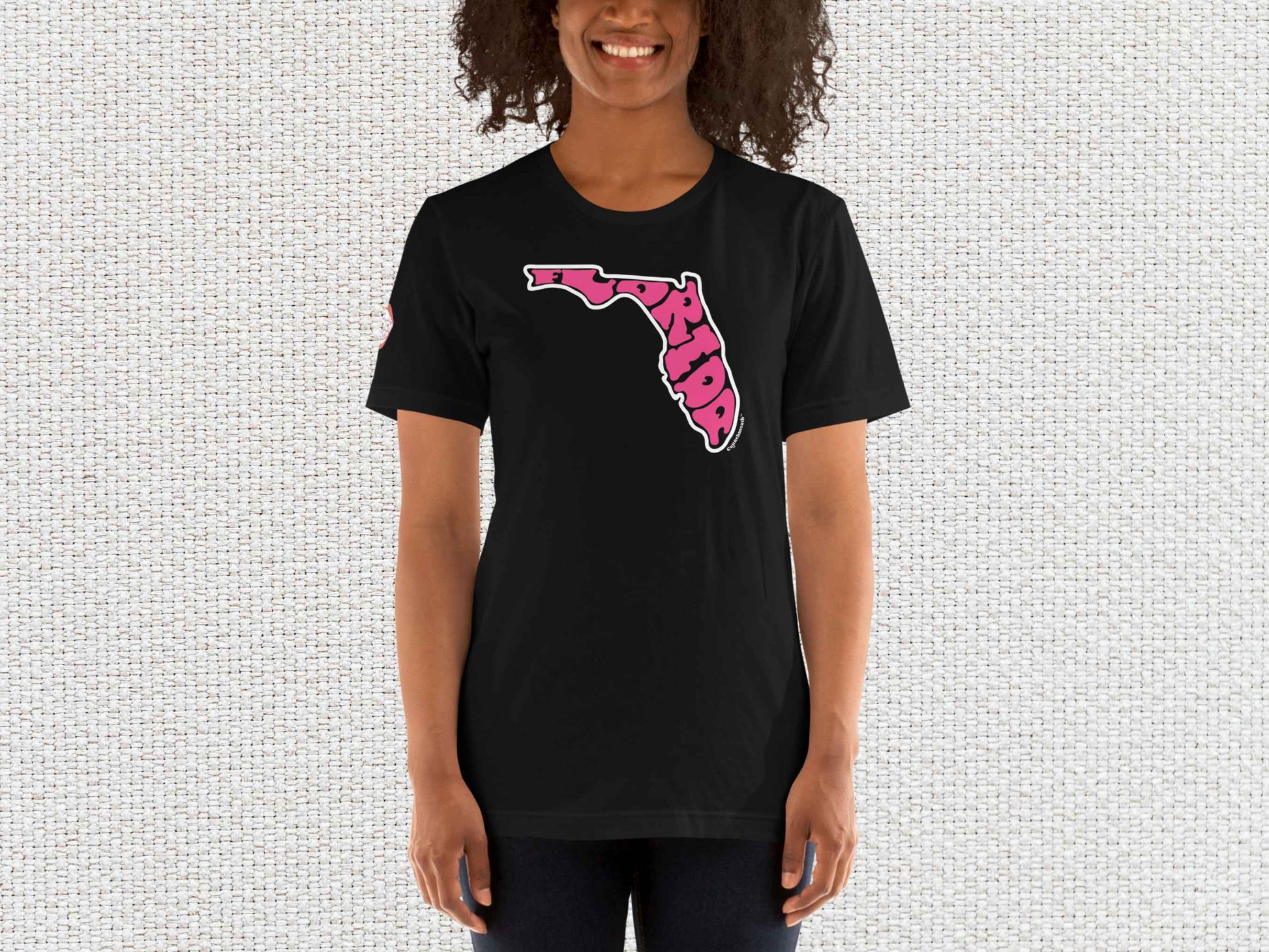 florida shirt, souvenir t shirts, female model, front, light color textured background