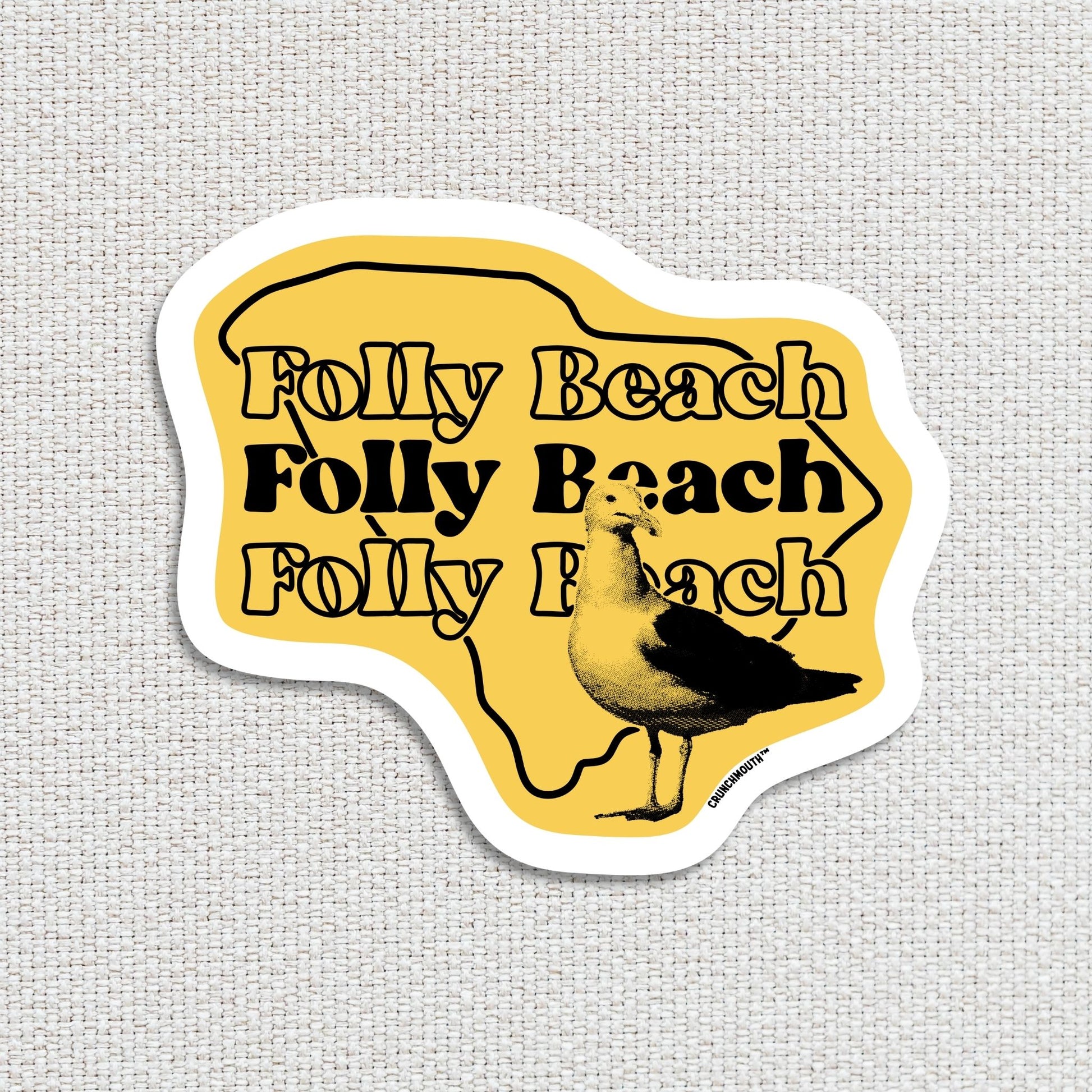 folly beach seagull travel luggage sticker, textured fabric background
