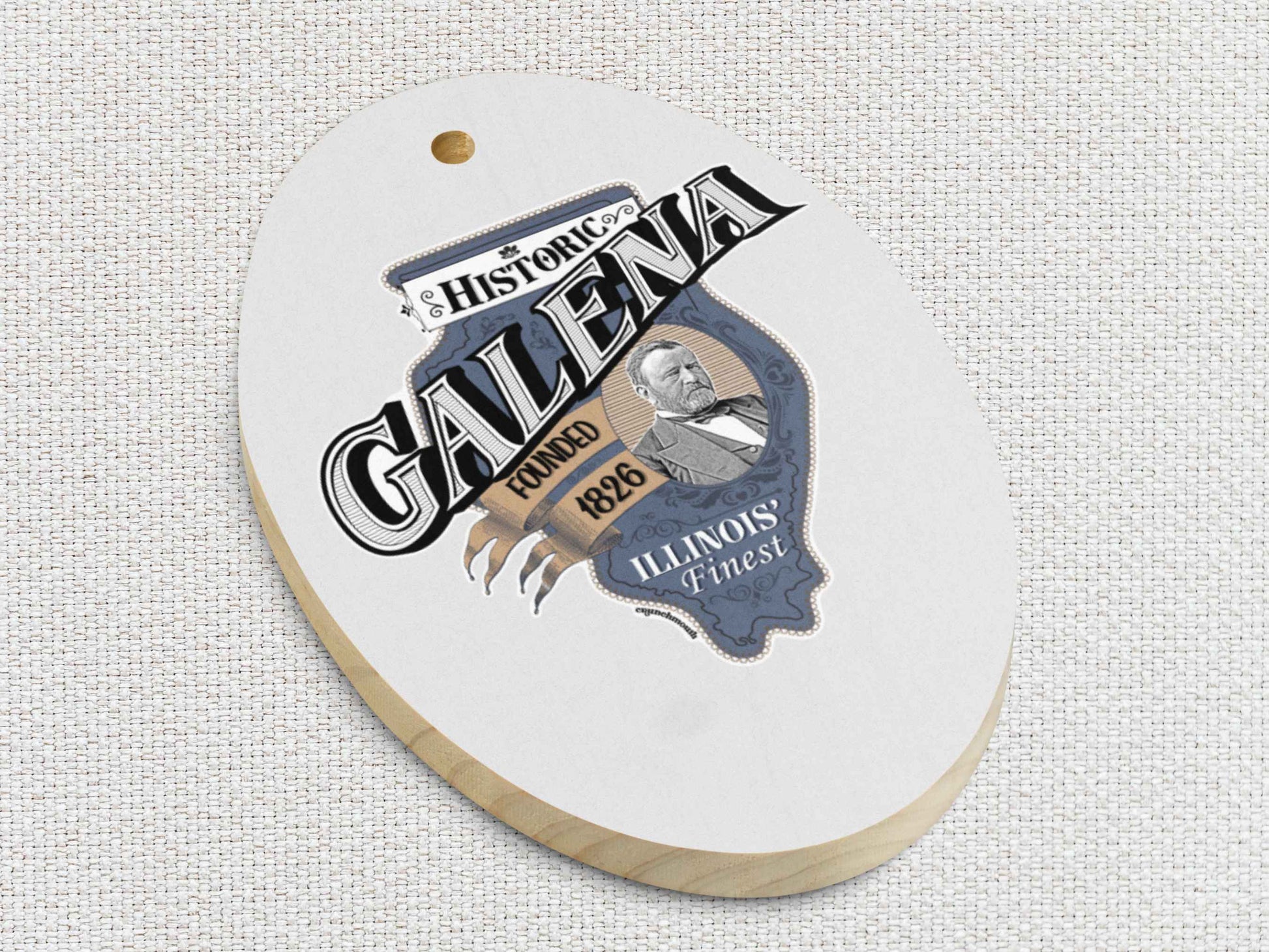 galena Christmas ornament, front bottom left side, white textured background