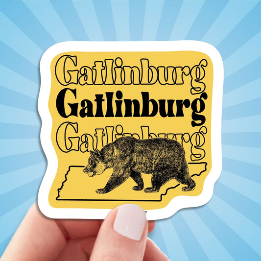 gatlinburg travel luggage sticker, hand display, sun rays design background