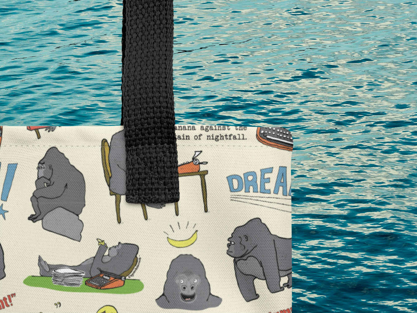 funny gorilla tote bag, flat, close up, blue water background