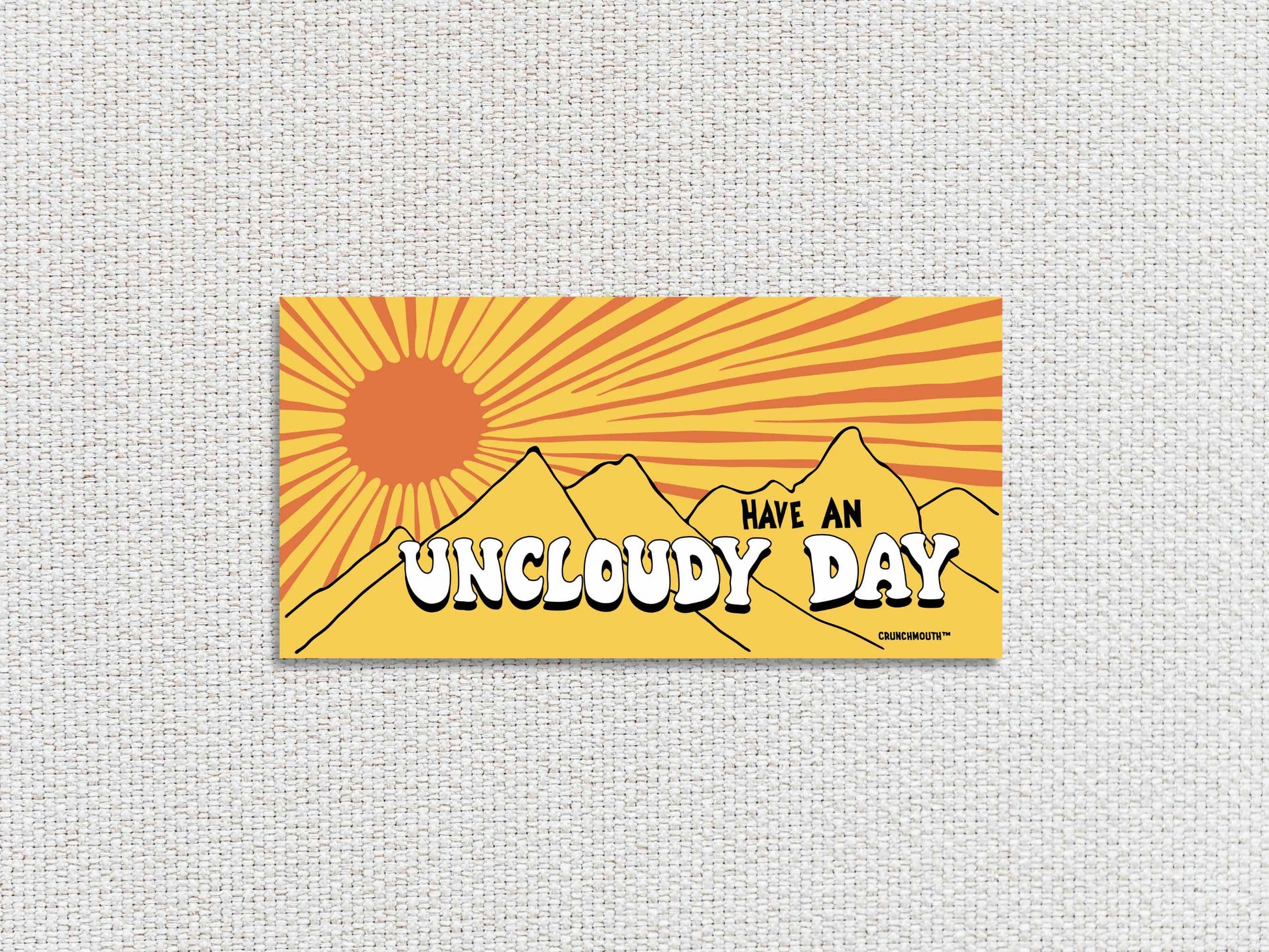 have an uncloudy day bumper sticker, white textured fabric background
