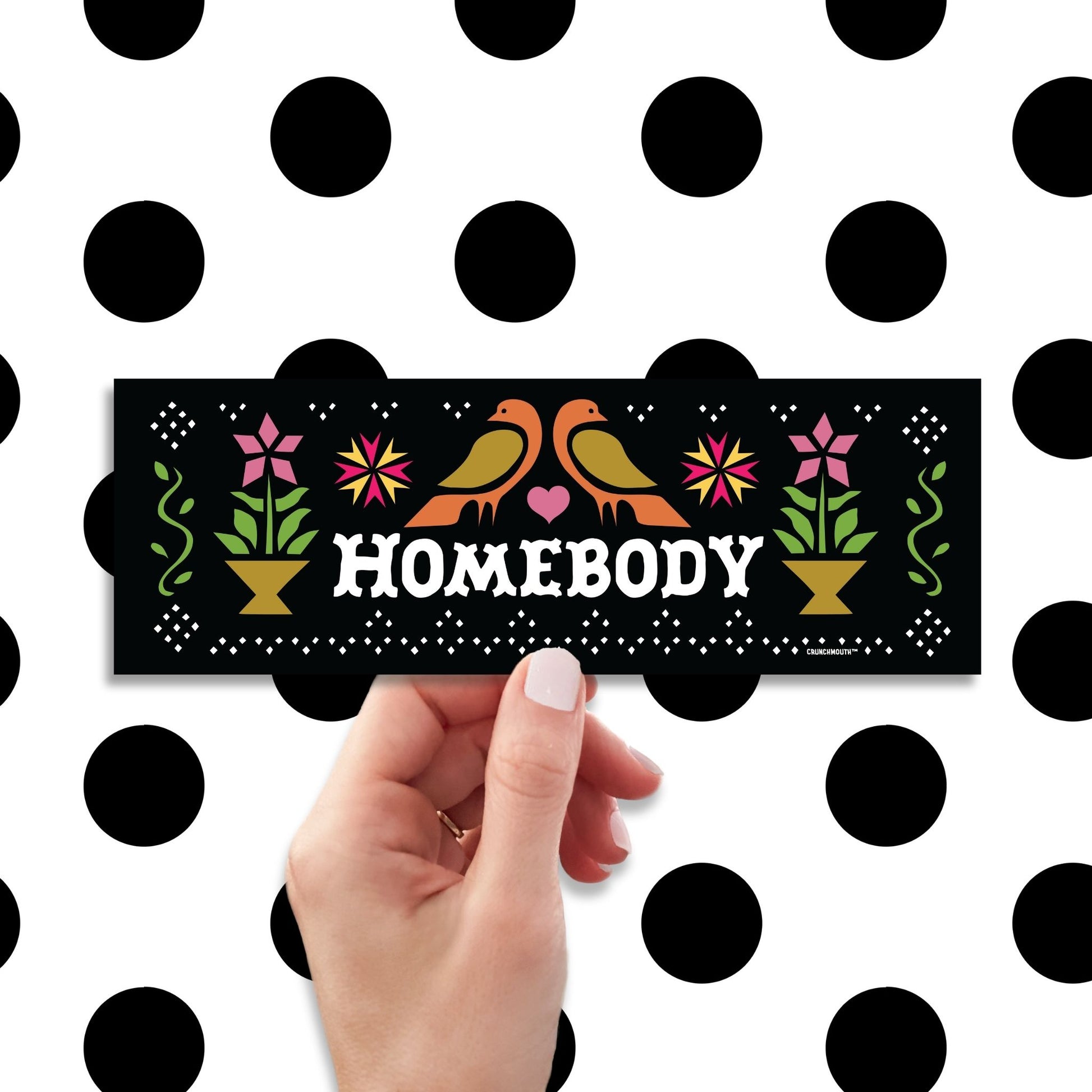 homebody bumper sticker, hand display, polka dots pattern design background
