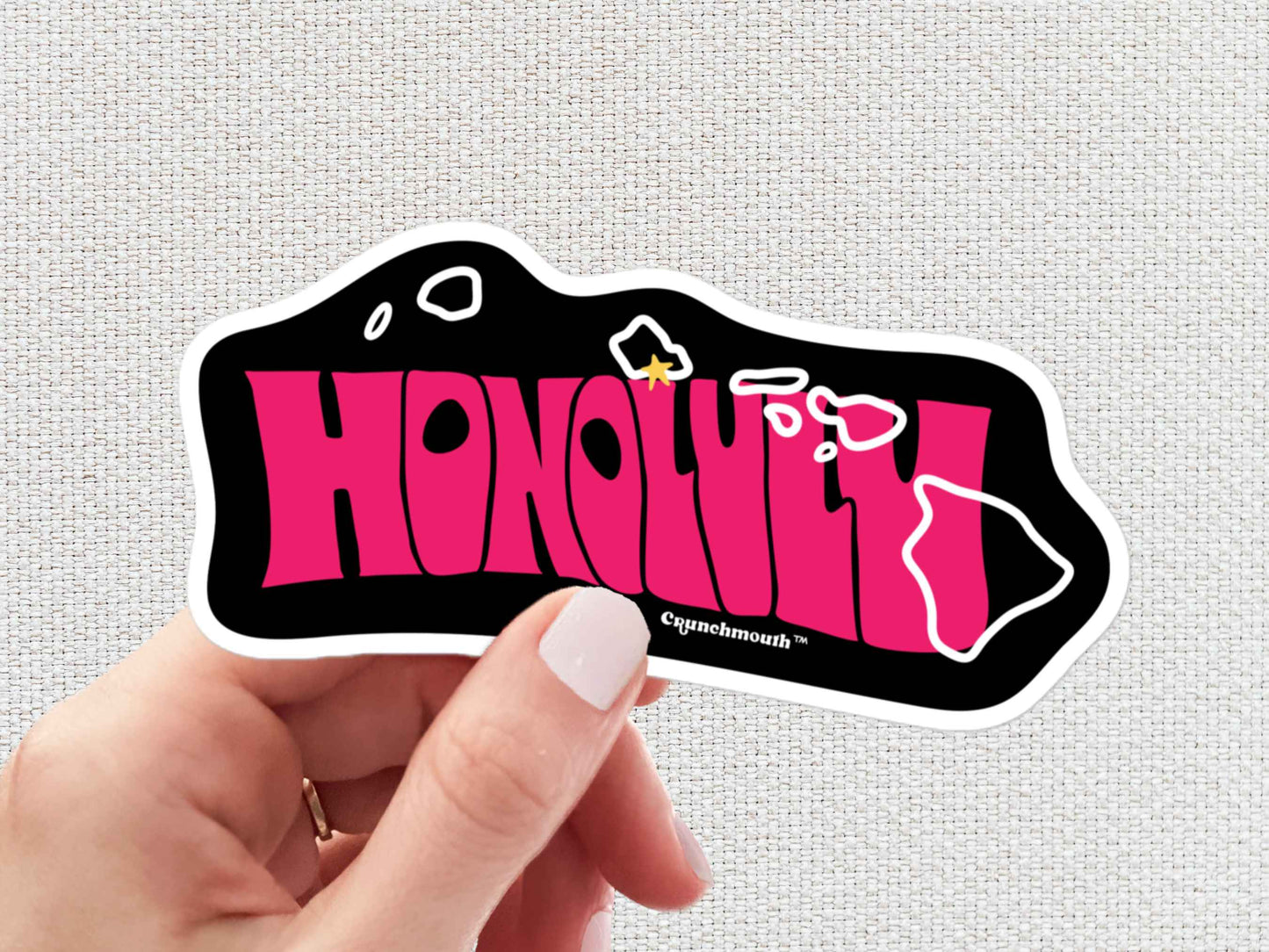 honolulu sticker, hand display, white textured background