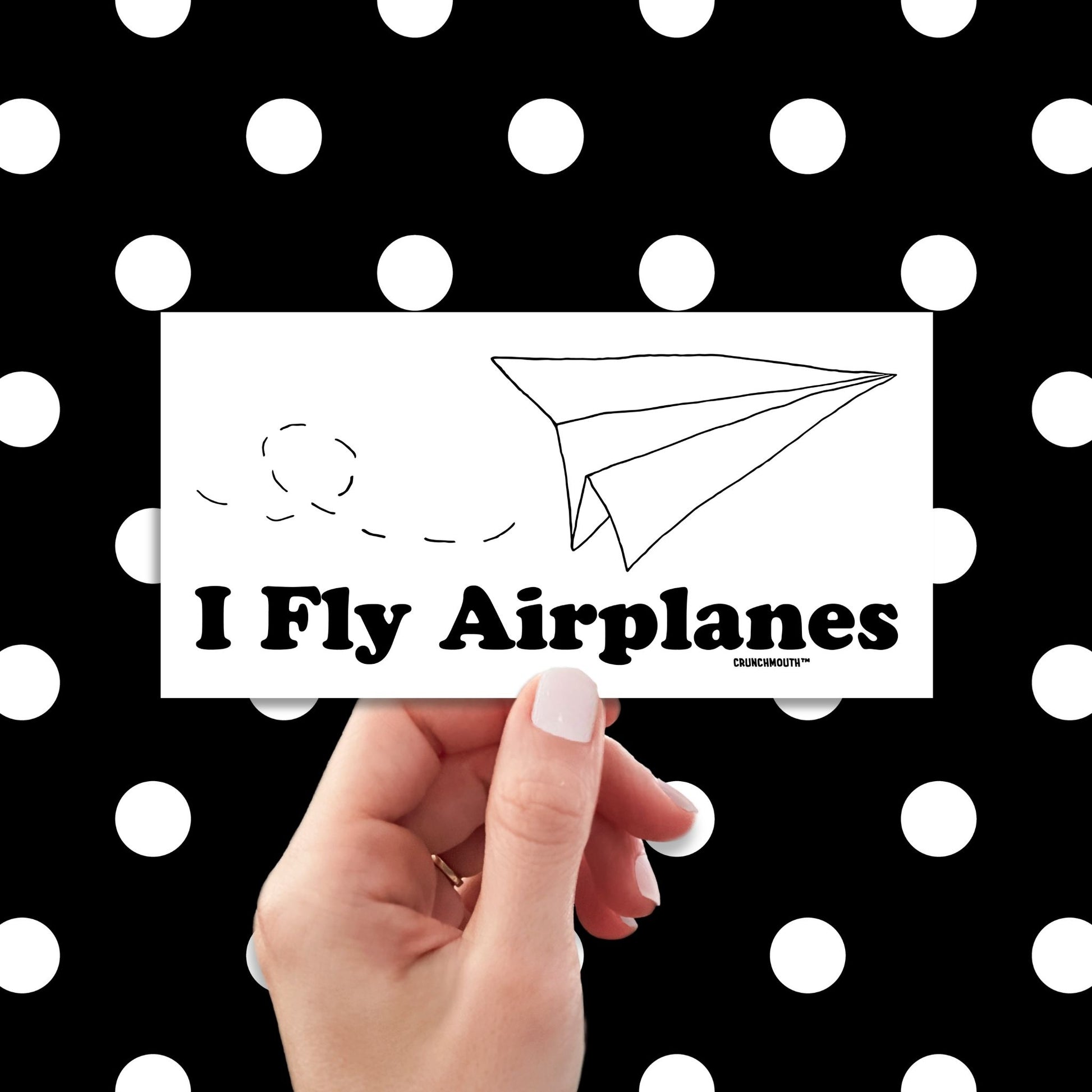 i fly airplanes bumper sticker, hand display, polka dots pattern design background
