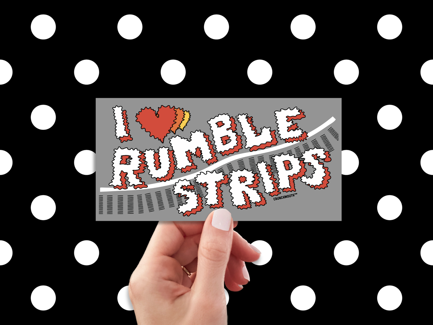i love rumble strips bumper sticker, hand display, polka dot background