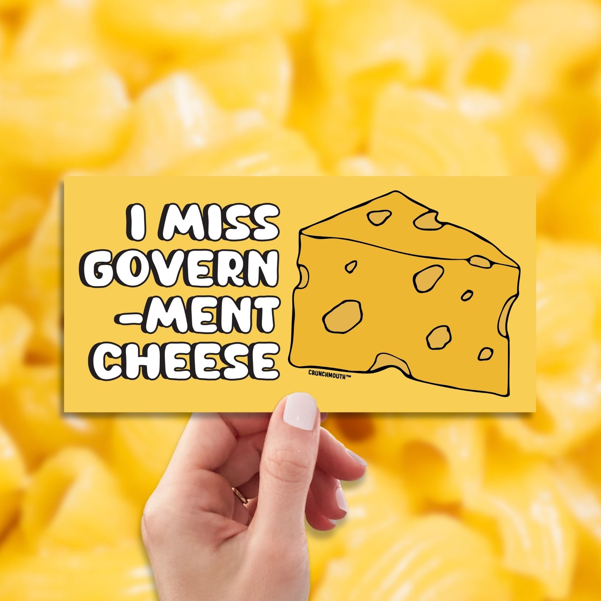 i miss government cheese bumper sticker, hand display, mac and cheese background