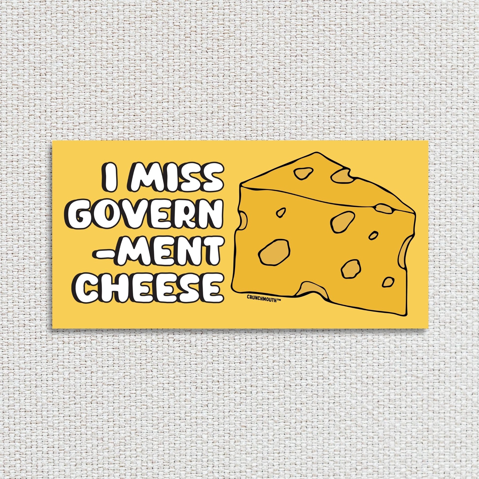 i miss government cheese bumper sticker, hand display, white textured fabric background