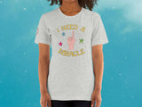 i need a miracle t-shirt, front, female, blue sky background