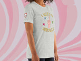 i need a miracle t-shirt, front right, female, pink swirl background