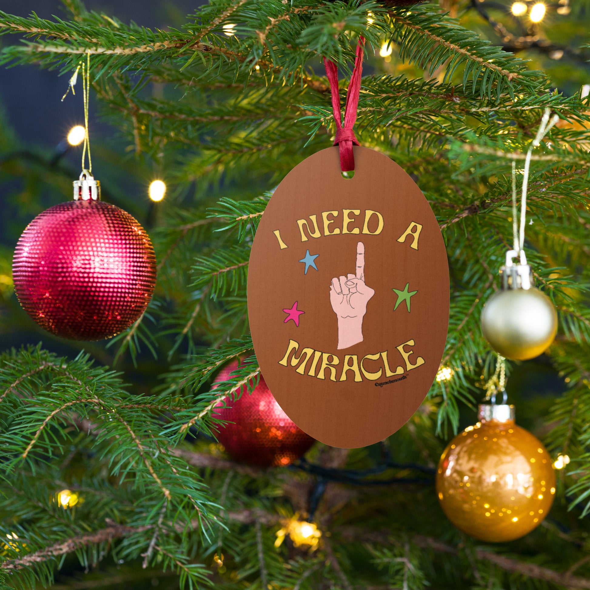 i need a miracle wooden Christmas ornament, front, Christmas tree background