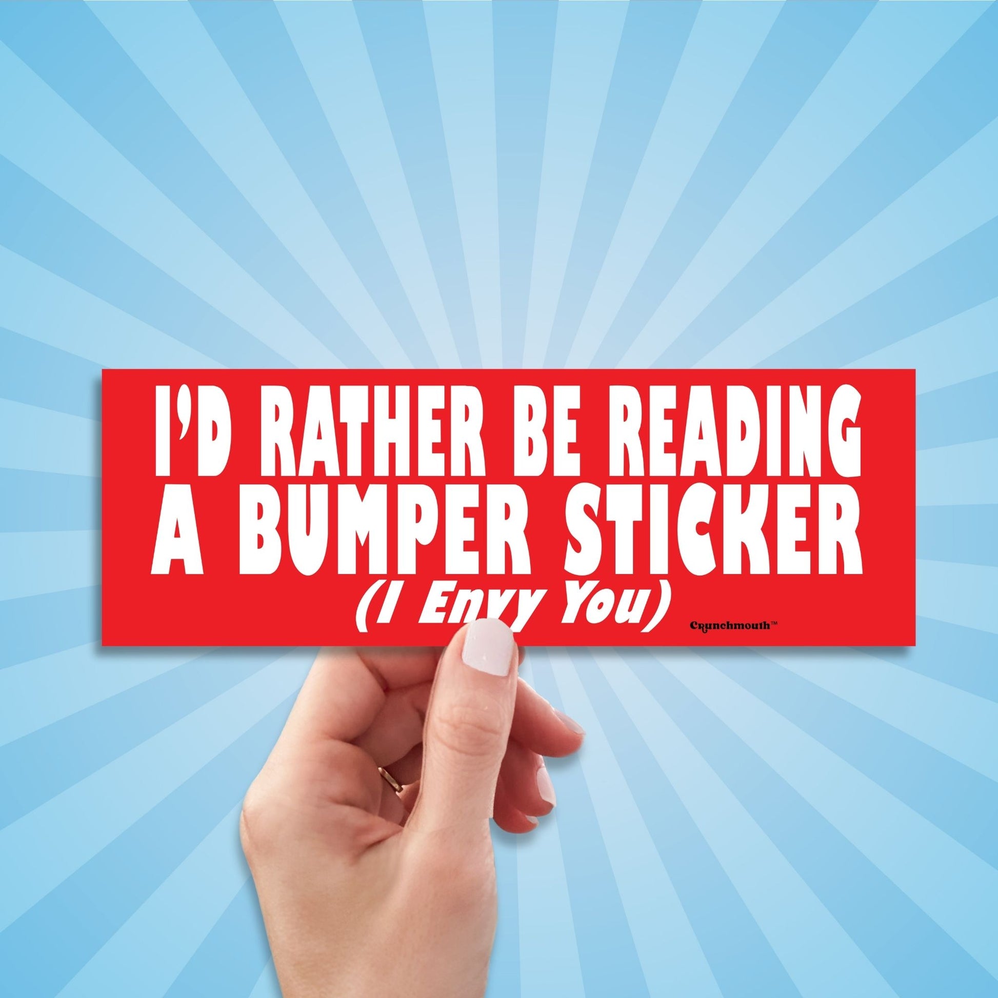 i'd rather be reading a bumper sticker (i envy you), funny bumper stickers, hand display, sun rays design background