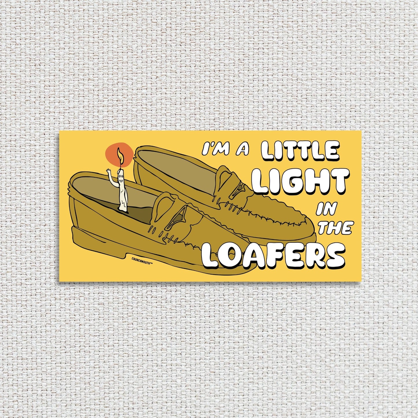 i'm a little light in the loafers bumper sticker, textured fabric background
