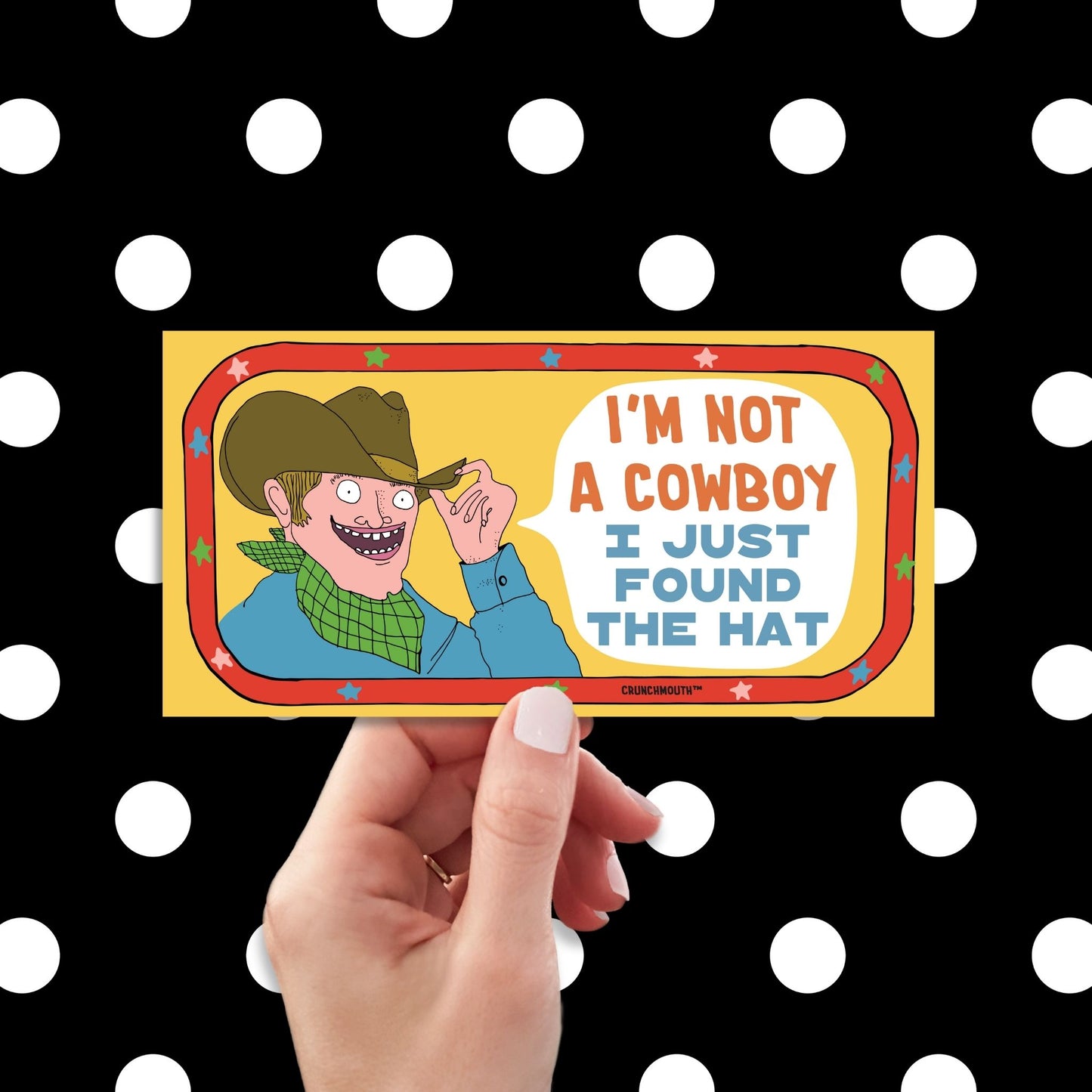 i'm not a cowboy (I just found the hat) funny western-themed bumper sticker, hand display, polka dots pattern design background