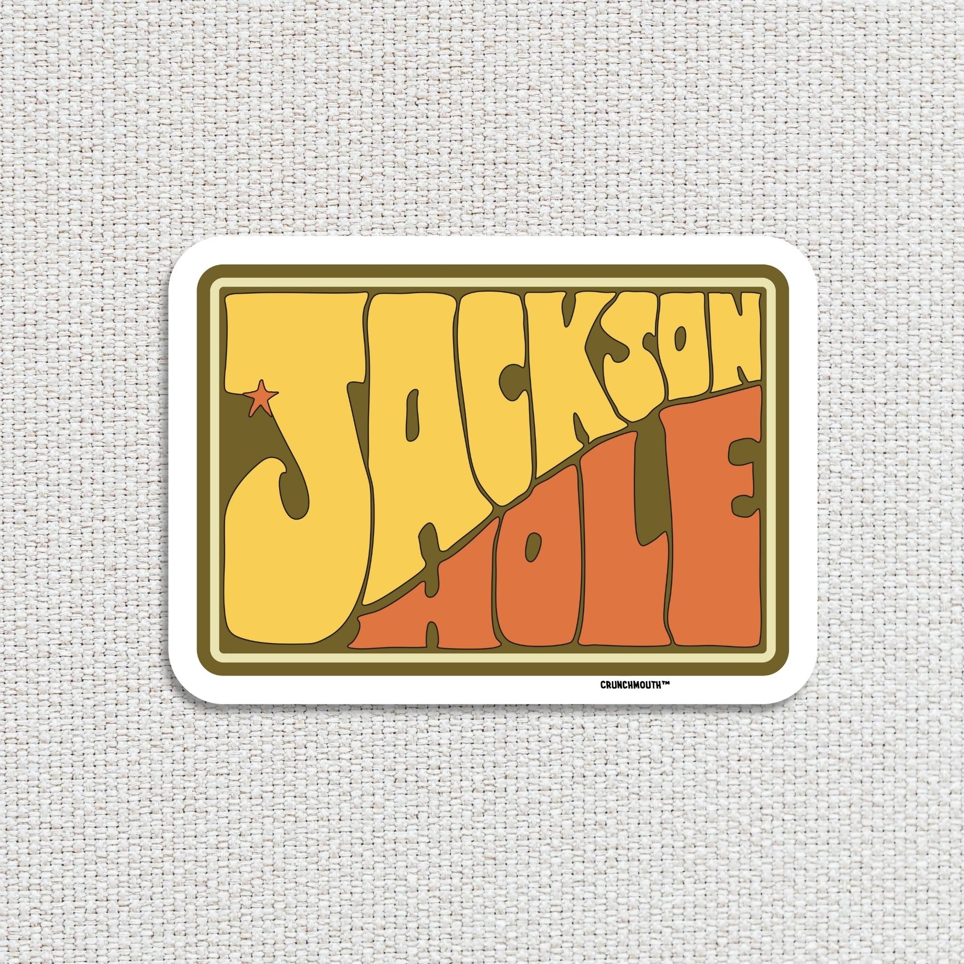 jackson hole wyoming travel luggage sticker, textured fabric background