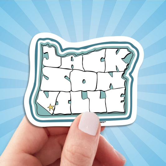 Jacksonville oregon travel luggage sticker, hand display, sun rays design background
