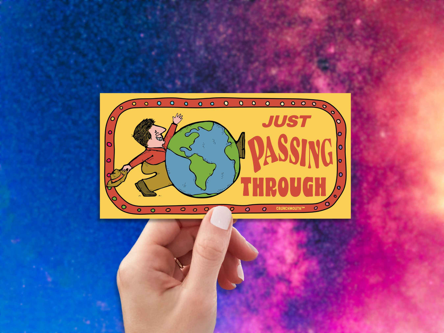 just passing through bumper sticker, hand display, colorful galaxy sky background
