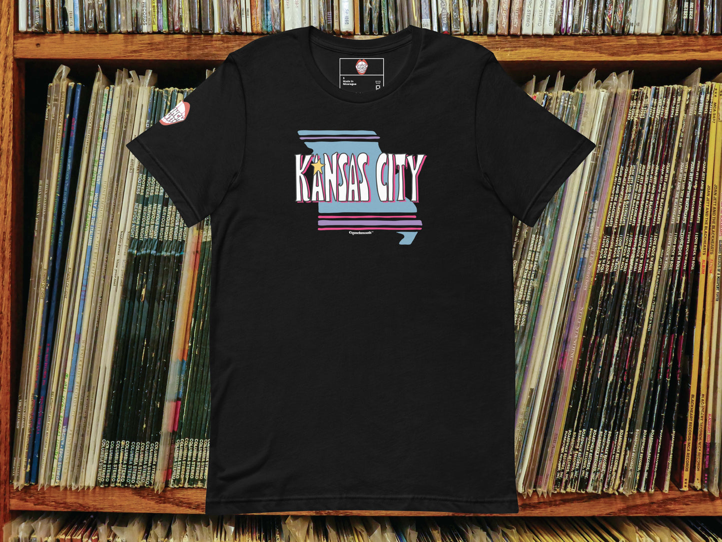 kansas city missouri t-shirt, flat, front, vinyl record shelf background