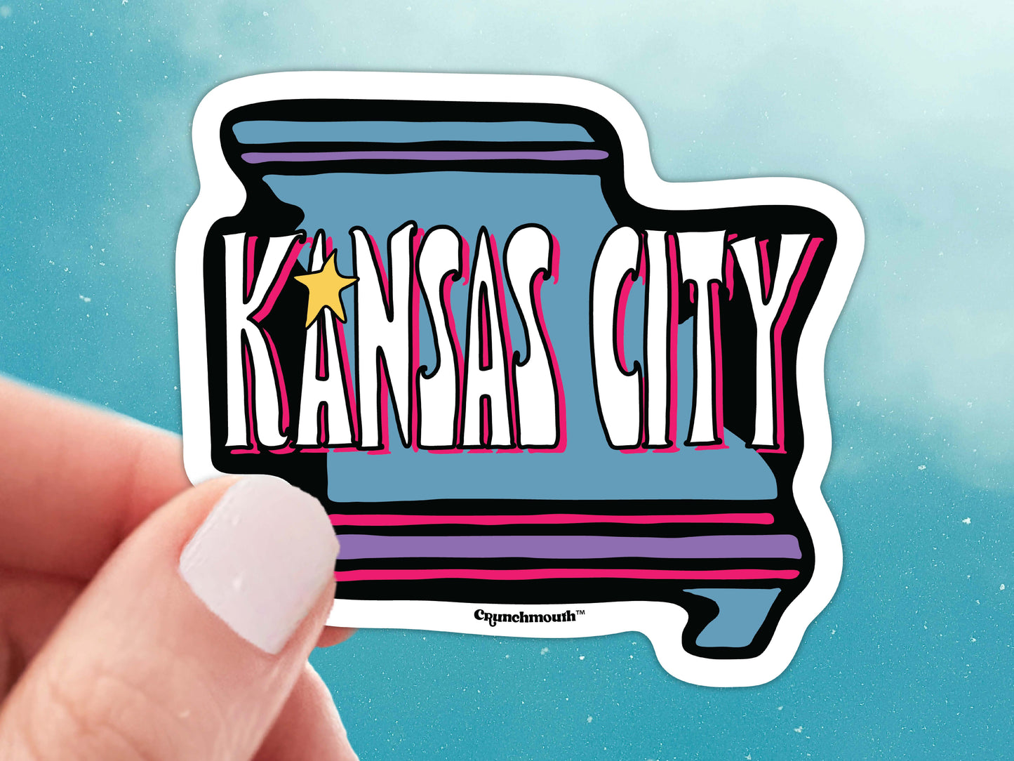 kc missouri laptop sticker, hand display, blue sky background