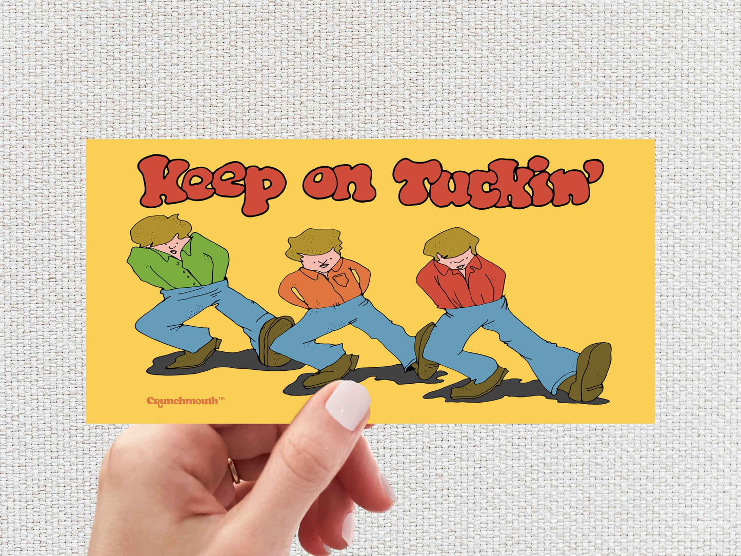 keep on tuckin' bumper sticker, funny bumper stickers, hand display, white textured background