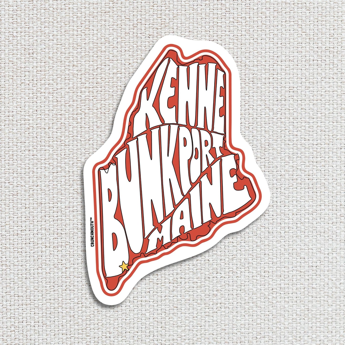 Kennebunkport travel luggage sticker, textured fabric background
