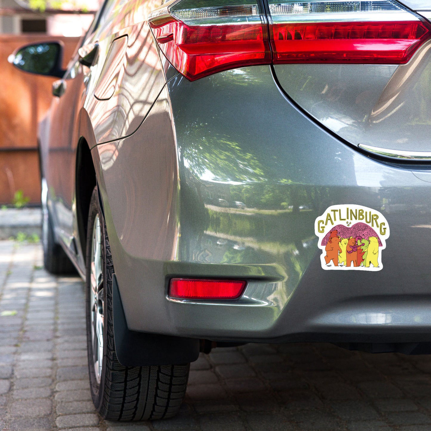 gatlinburg dancing bears die cut sticker displayed on rear bumper of car