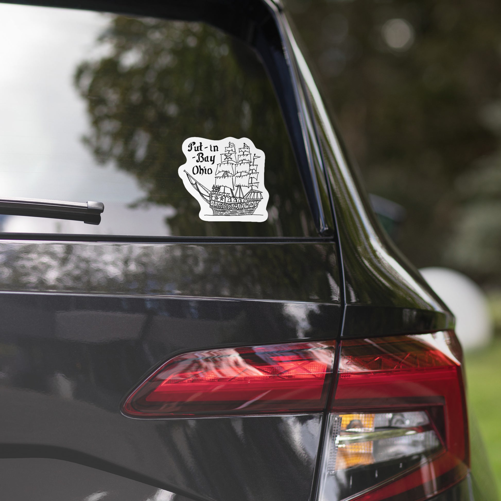 put in bay ohio 5.5 inch sticker displayed on rear window of vehicle