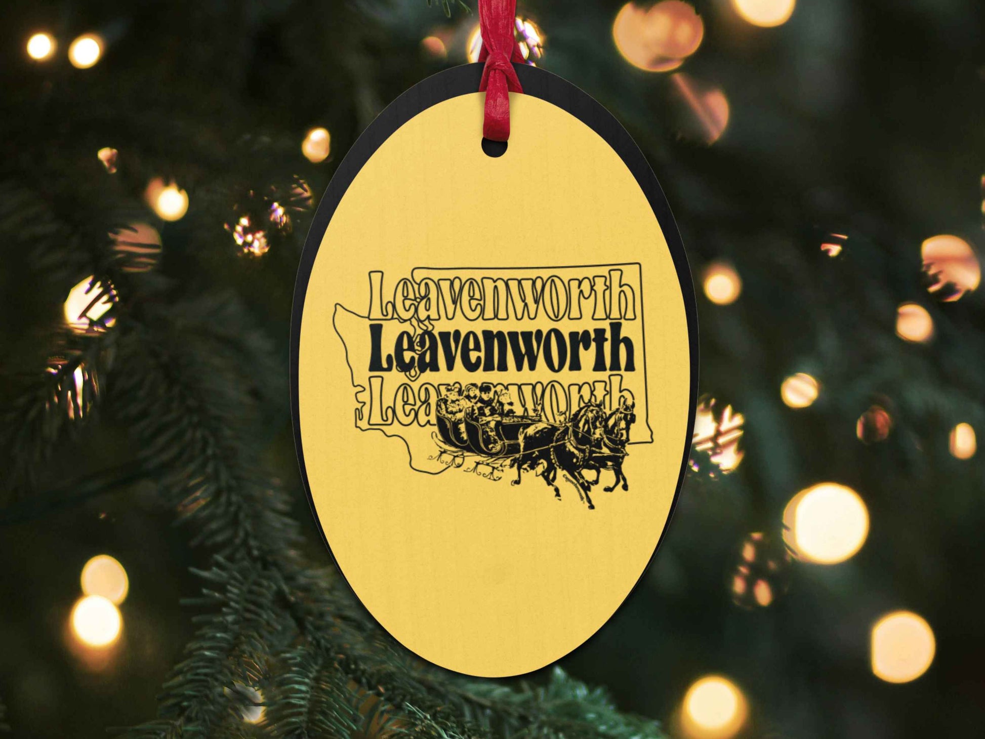 leavenworth Christmas ornament, back, Christmas tree background