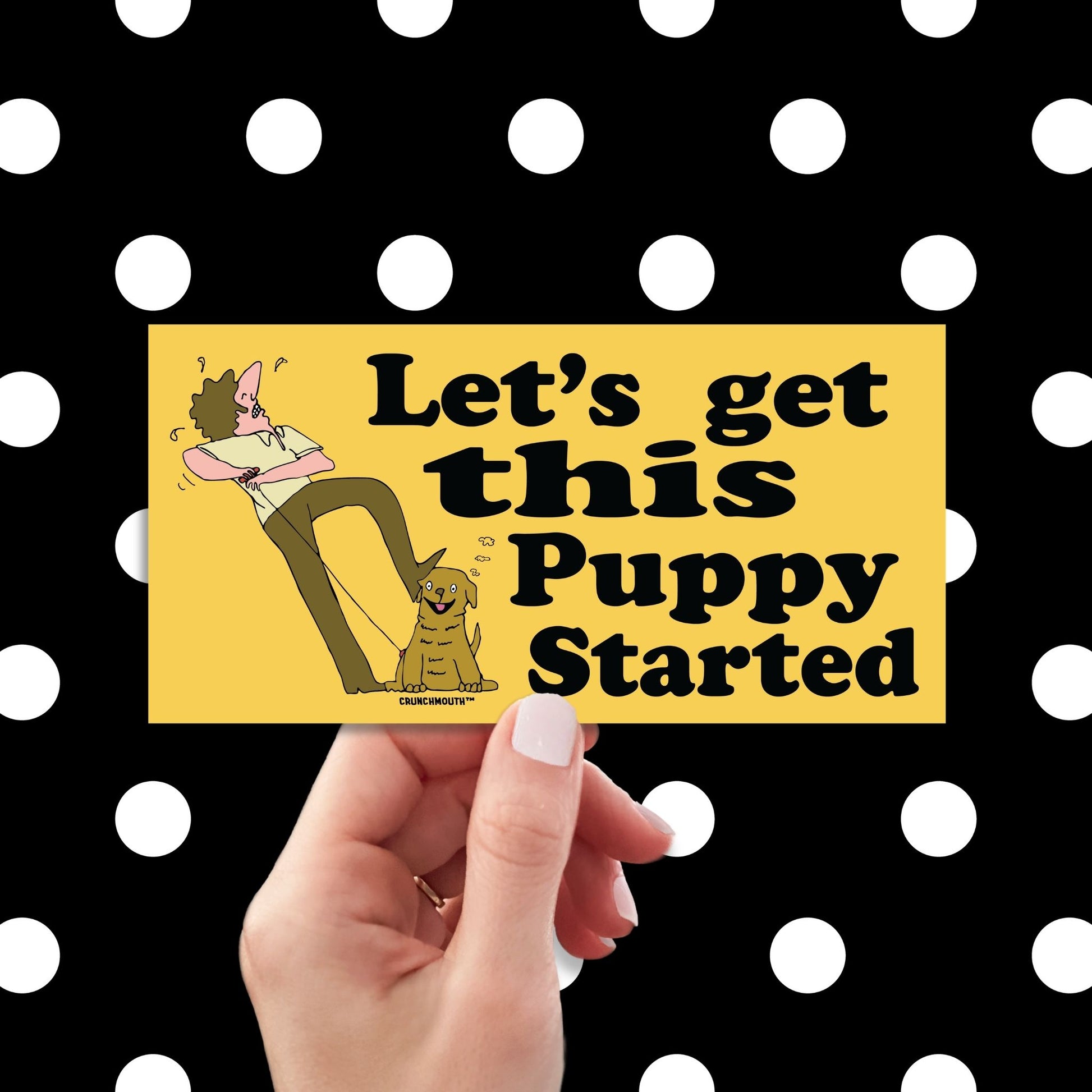 let's get this puppy started bumper sticker, hand display, polka dots pattern design background
