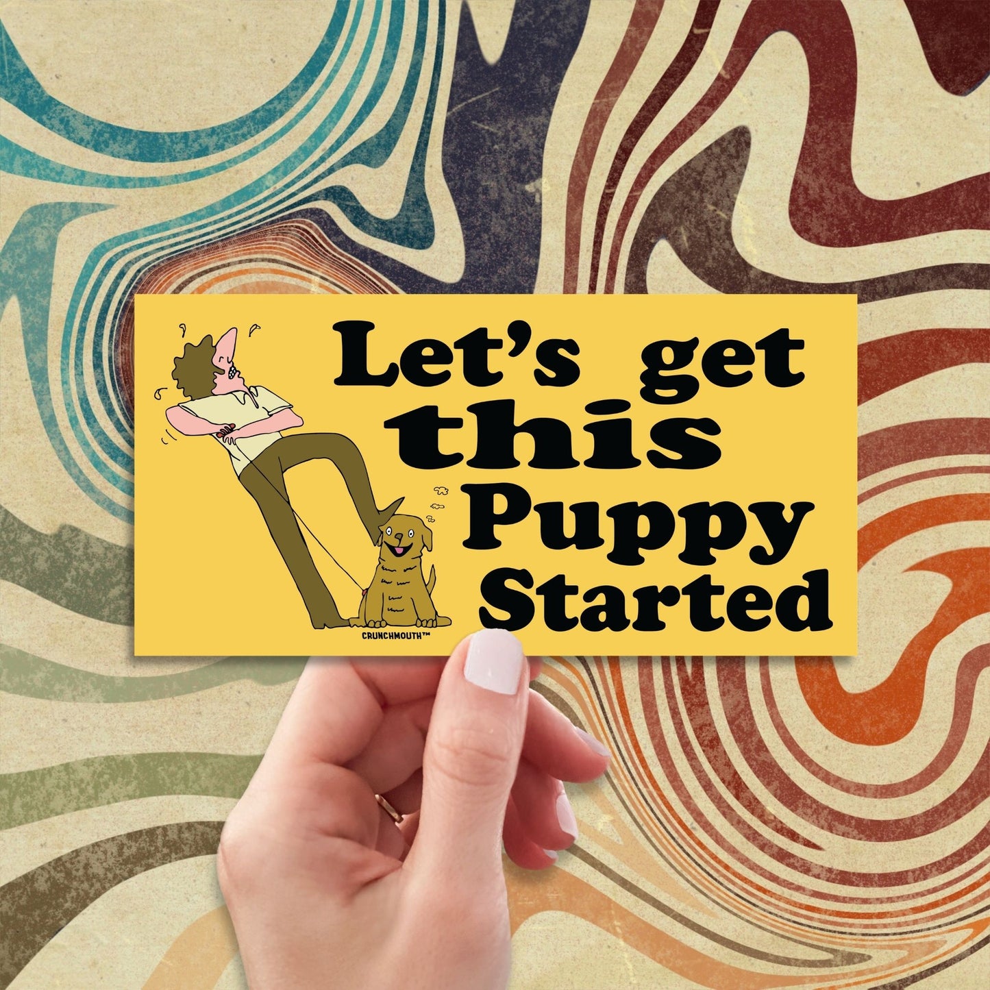 let's get this puppy started bumper sticker, hand display, retro style design background
