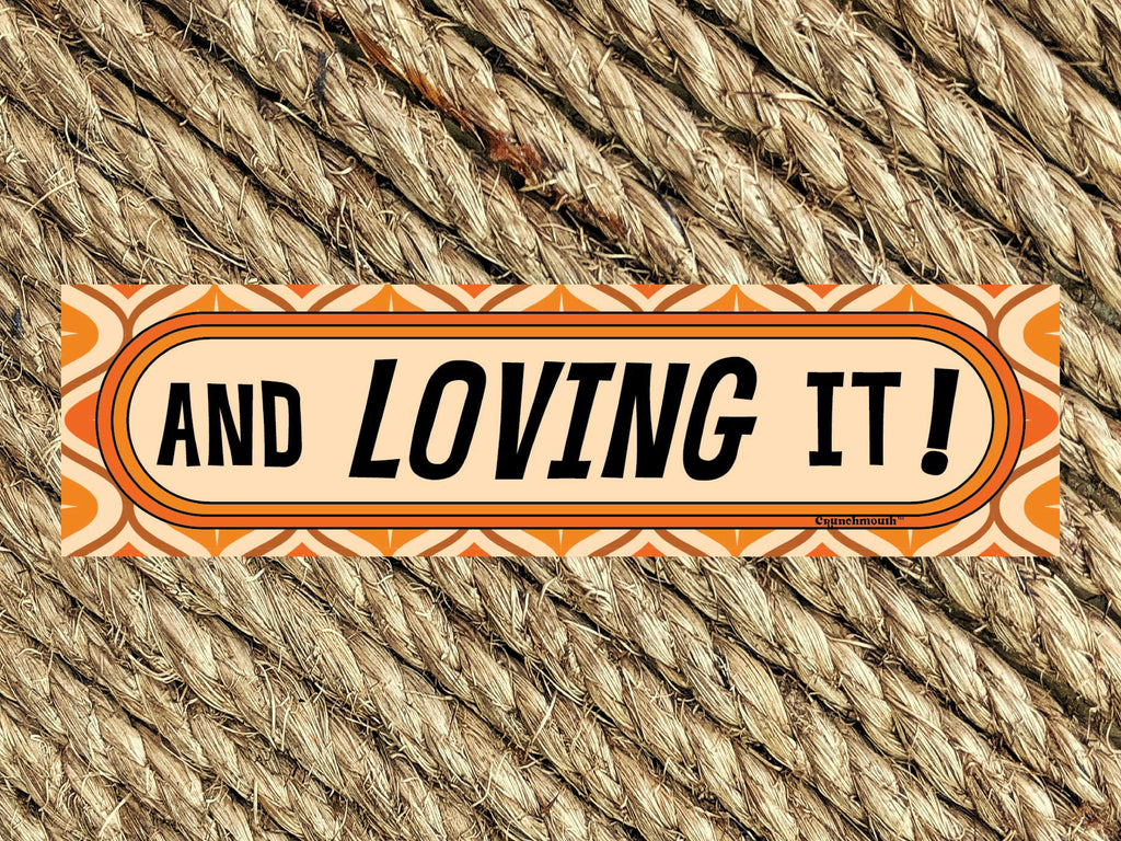 and loving it bumper sticker, woven rug background