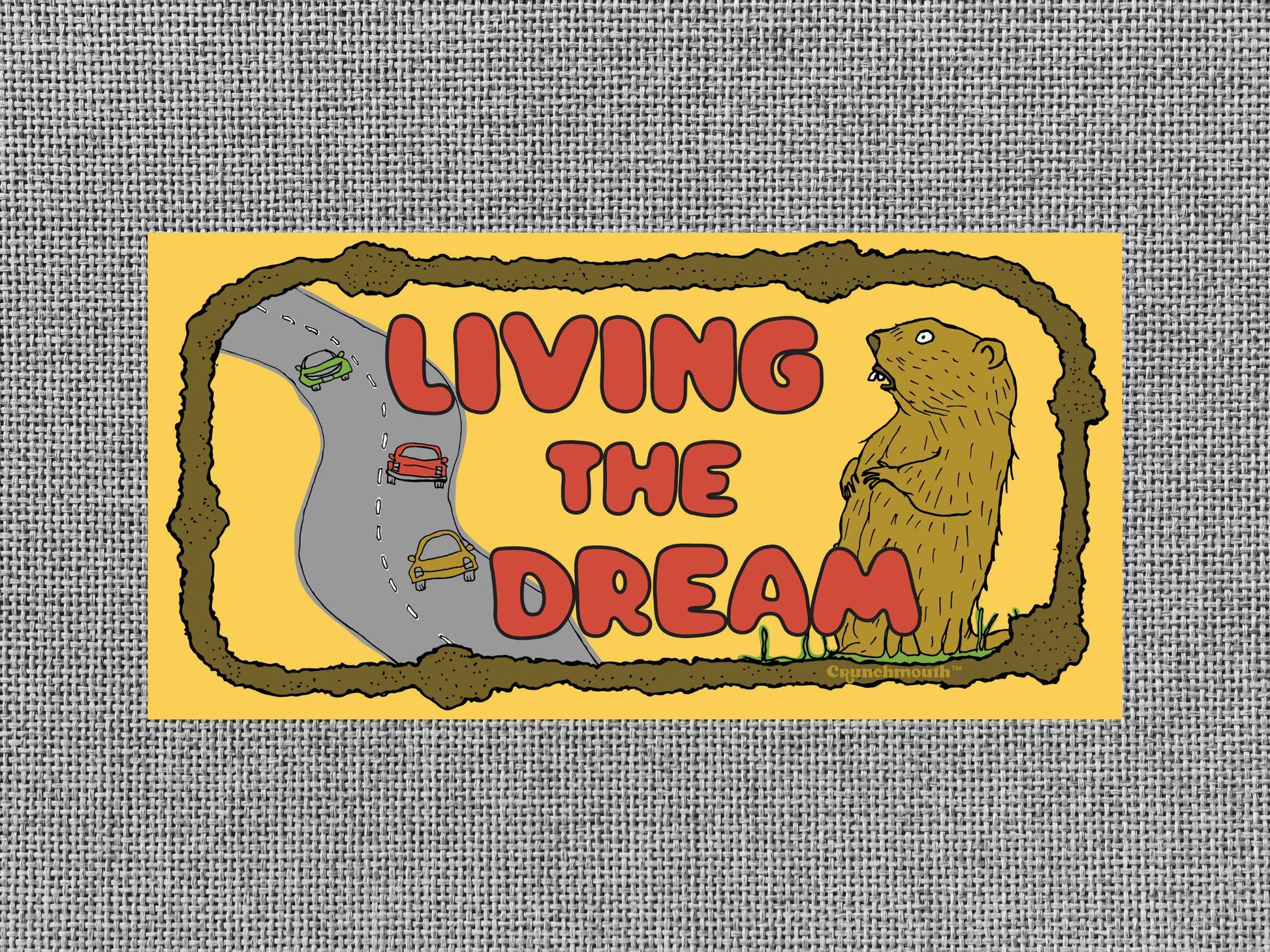 living the dream bumper sticker, funny groundhog sticker, gray textured background