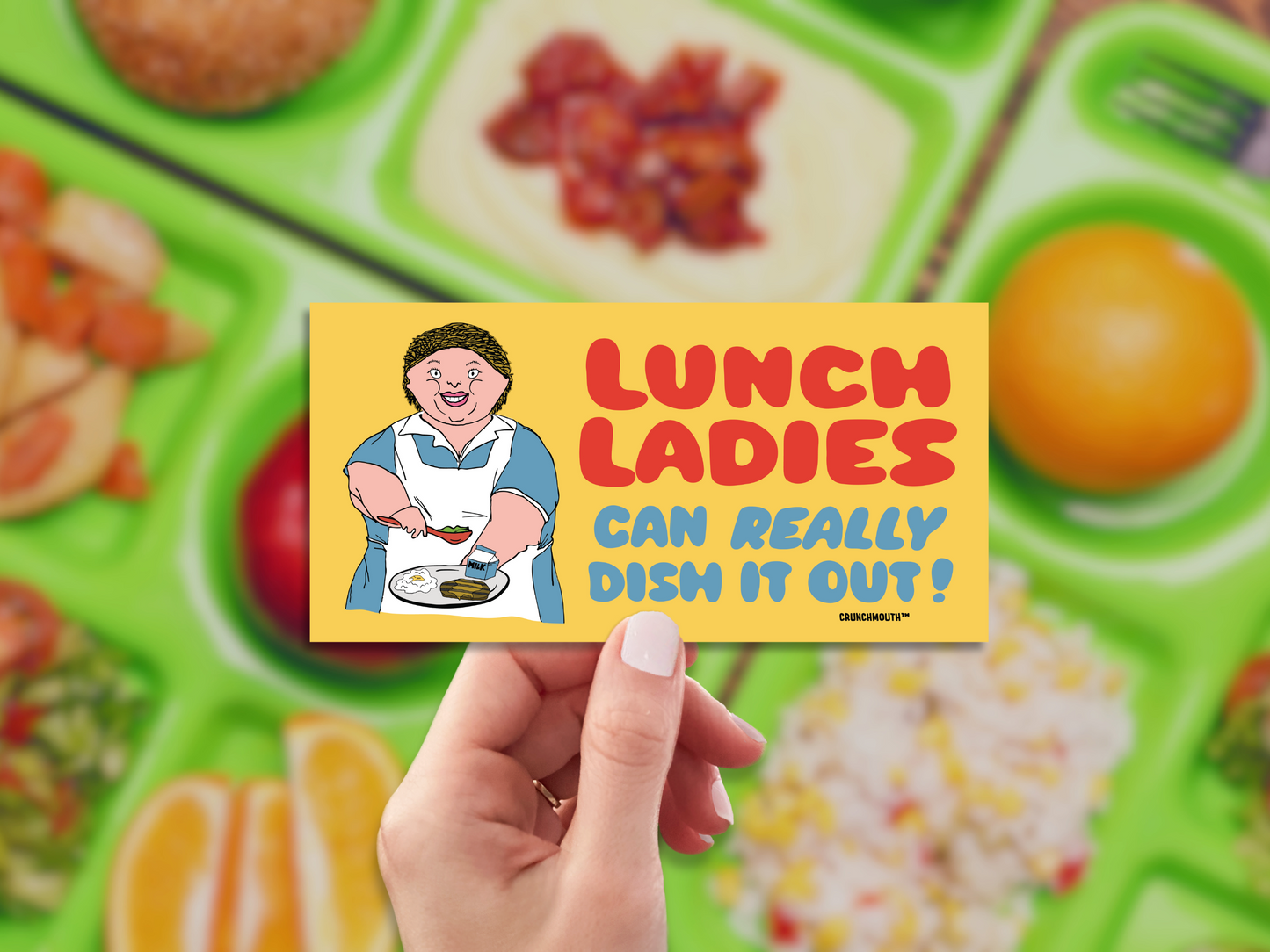 lunch ladies can really dish it out bumper sticker, hand display, cafeteria food tray background