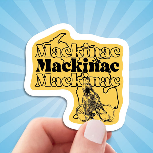 mackinac island Michigan travel luggage sticker, hand display, sun rays design background

