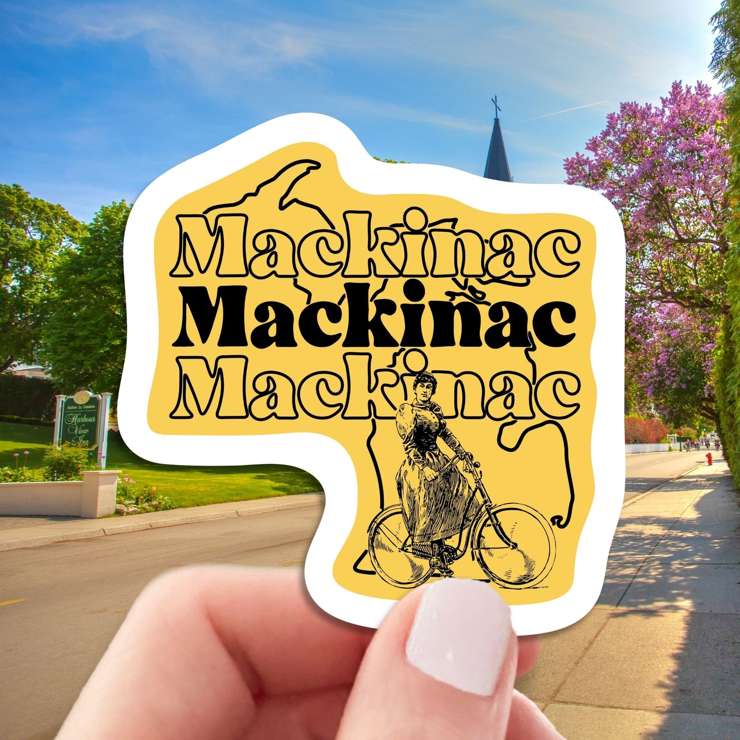 mackinac island Michigan travel luggage sticker, hand display, mackinac island background
