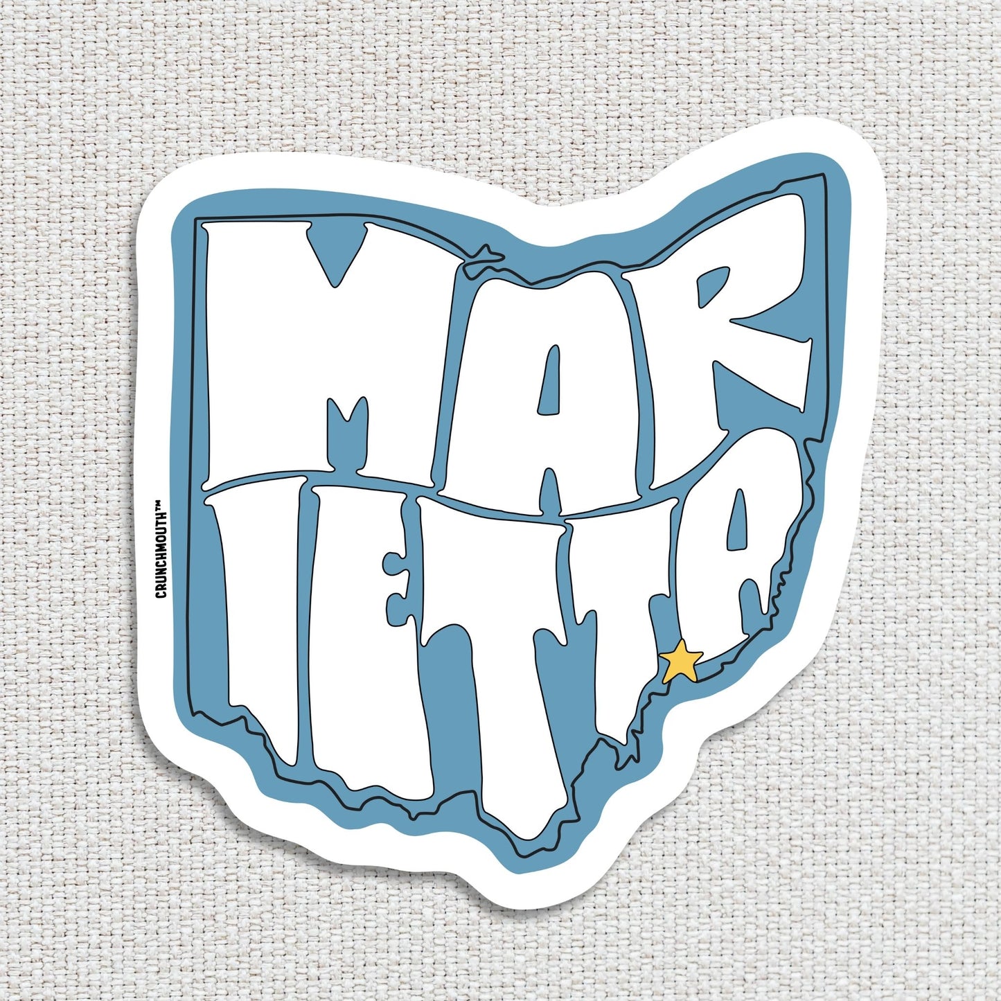 marietta travel luggage sticker, textured fabric background
