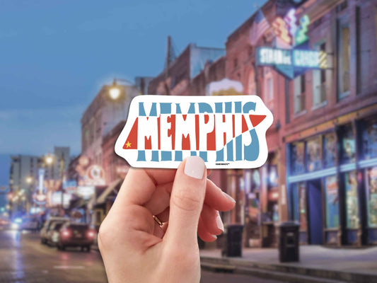 memphis travel luggage sticker, hand display, beale street music district background