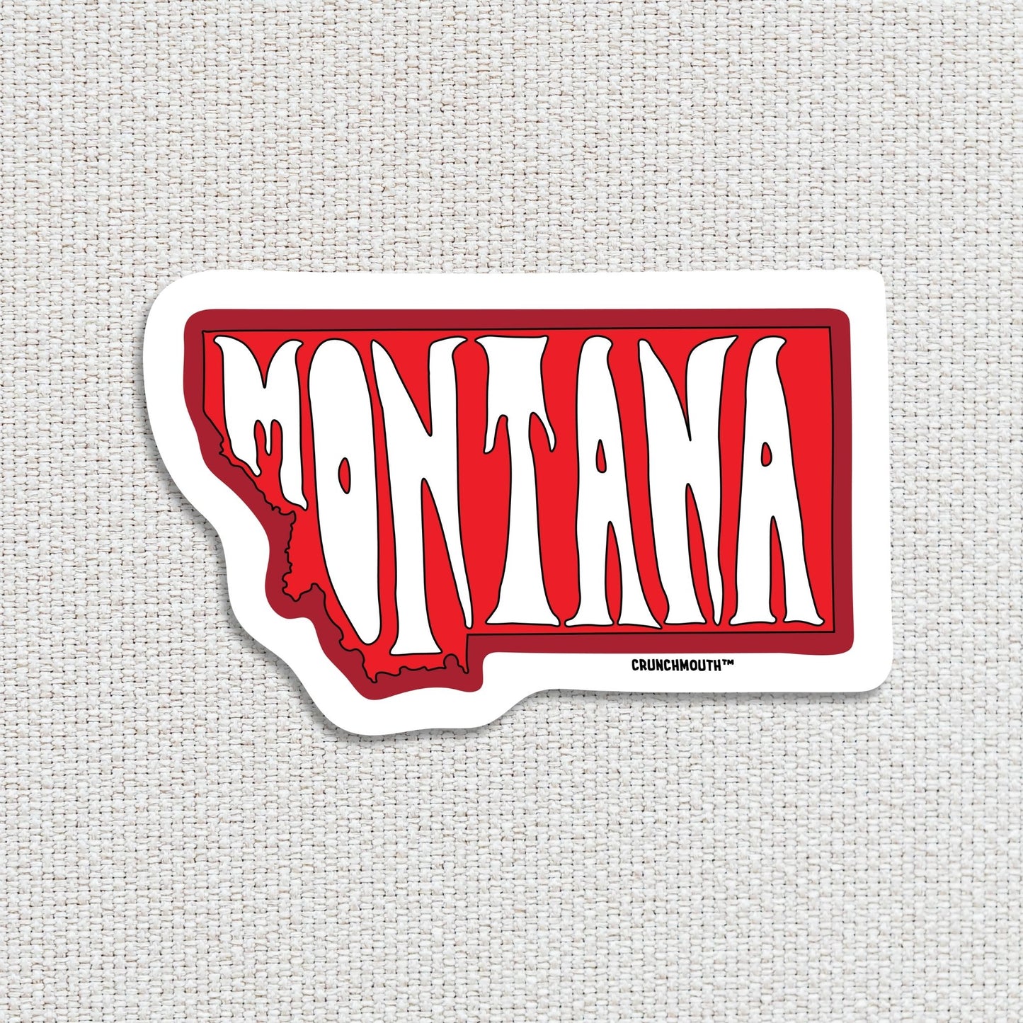 montana travel luggage sticker, textured fabric background
