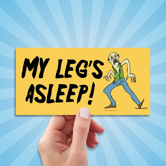 my leg's asleep bumper sticker, funny zombie sticker, hand display, sun rays design background
