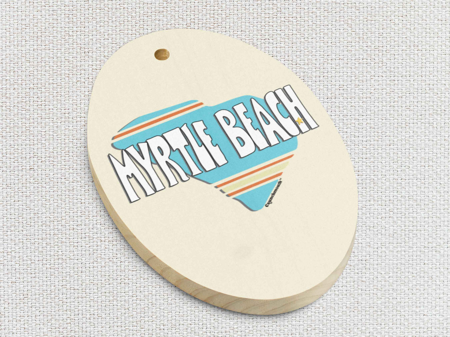 myrtle beach Christmas ornament, front bottom left side, white textured background