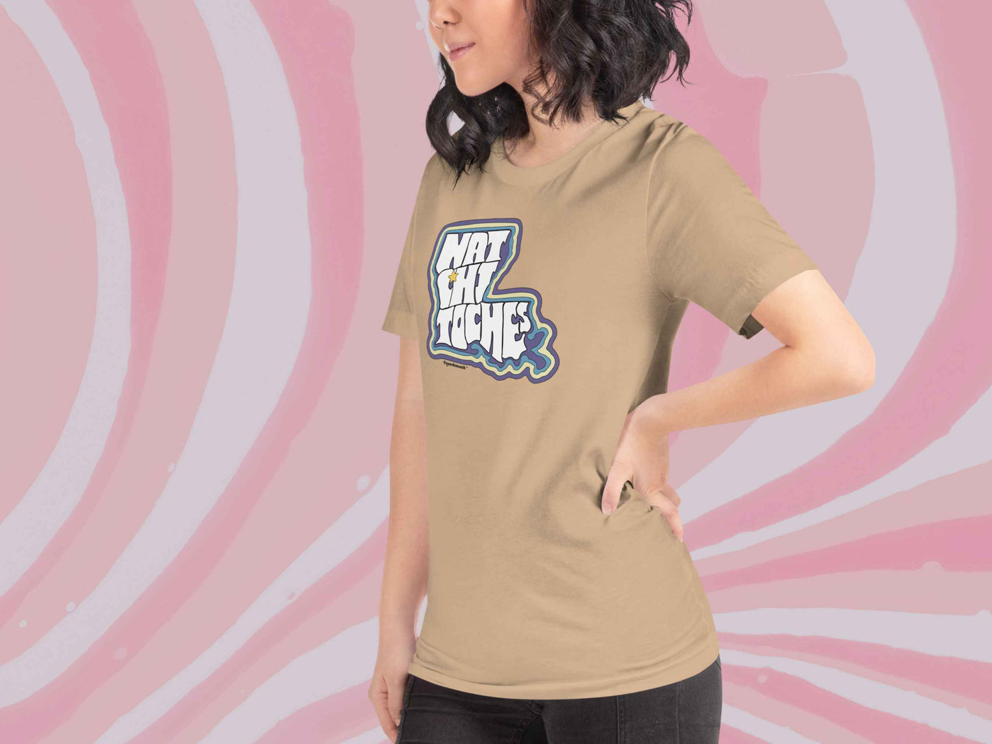 natchitoches la shirt, souvenir t shirts, front left, female model, pink swirl background