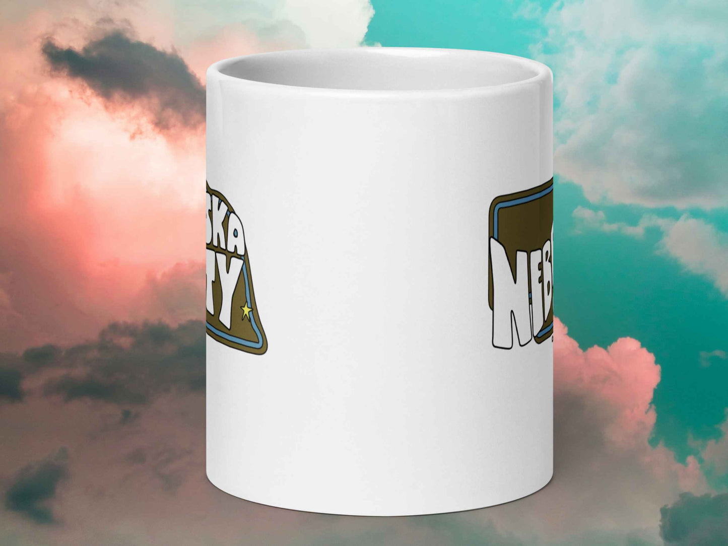 nebraska city mug, souvenir coffee mugs, 20 oz, front view, cloud sky background