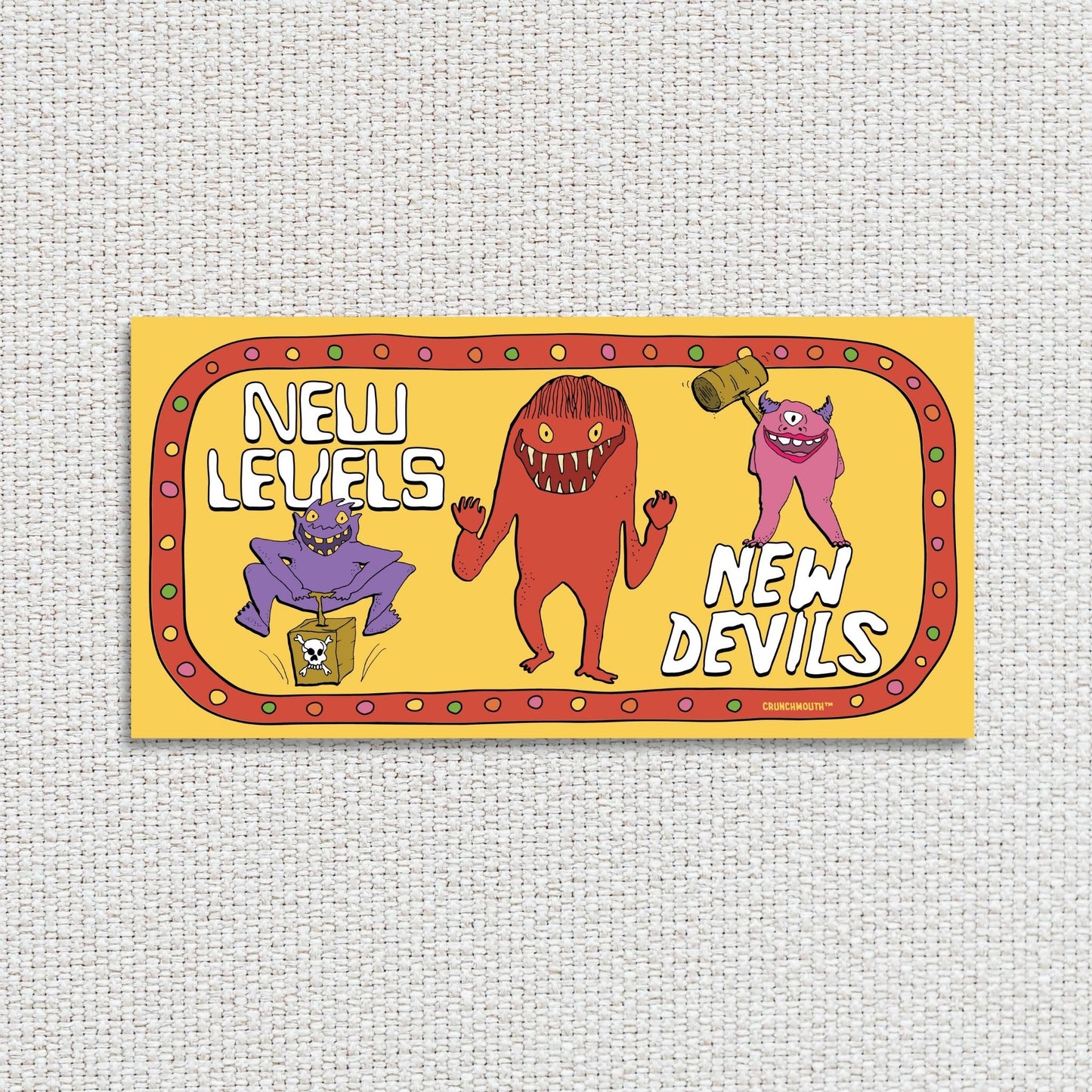 new levels new devils bumper sticker, textured fabric background
